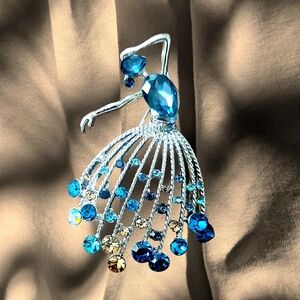 Elegant Silver and Blue Dancer Brooch